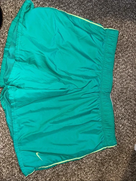 Nike Teal Running Shorts with Yellow Accent