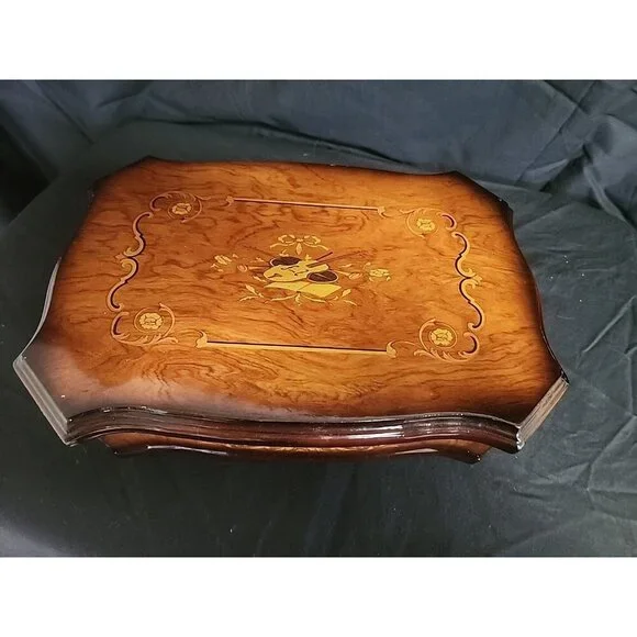 wooden jewelry box with violin pictured‎ on top