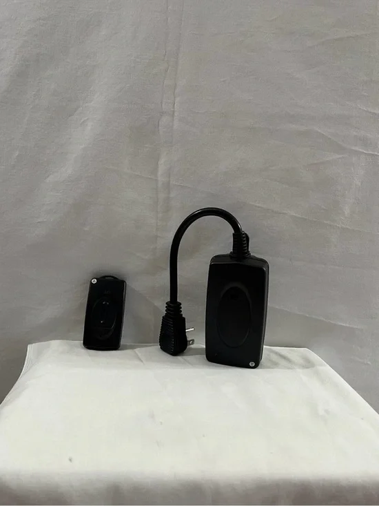 Black Remote and Power Adapter Set