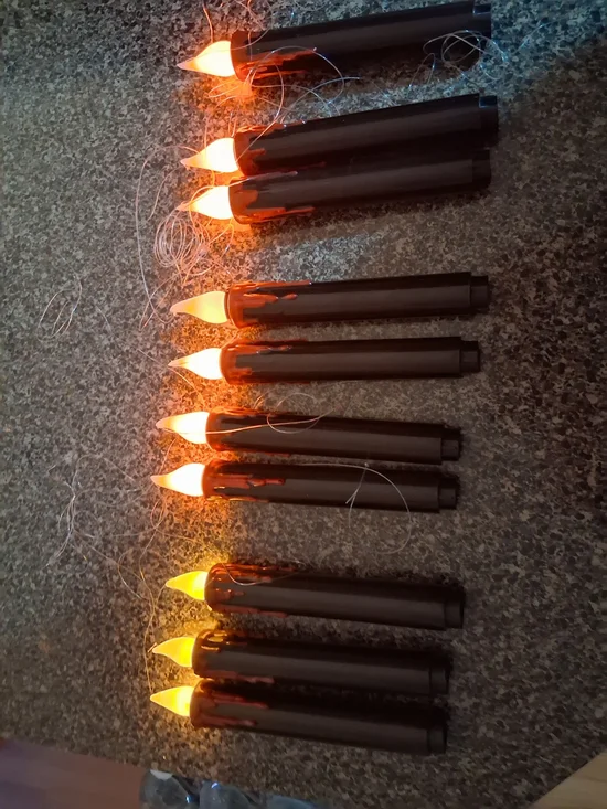 String of Black LED Candle Lights with Warm Amber Flames