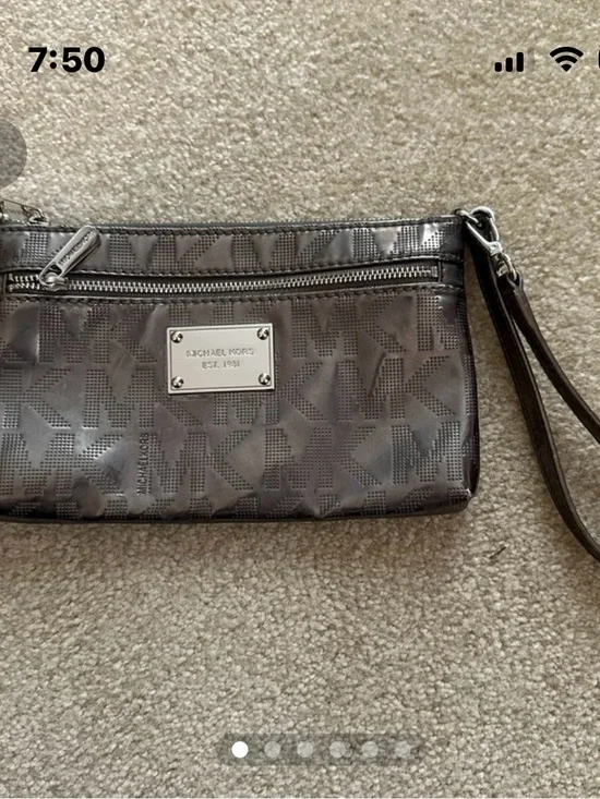 Michael Kors Metallic Gray MK Embossed Wristlet