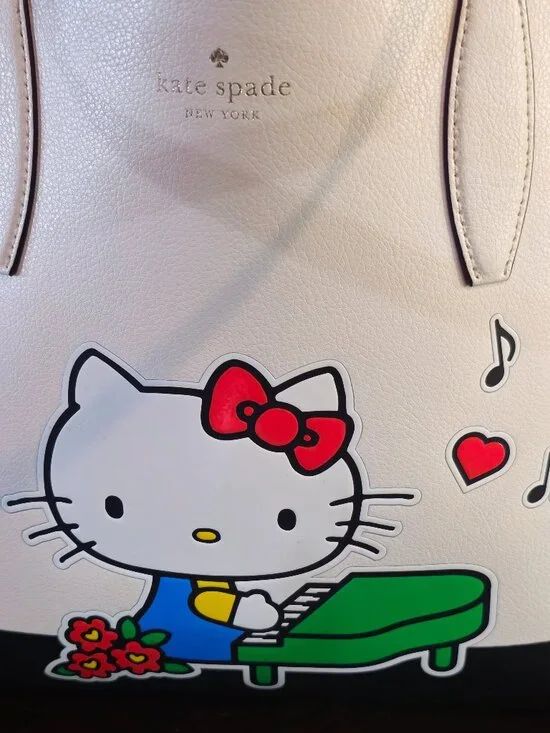 Hello kitty kate spade purse