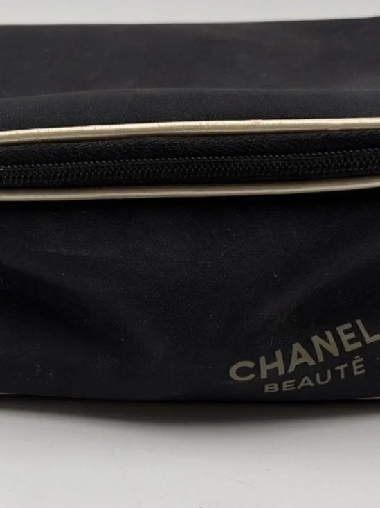 CHANEL Black Cosmetic Pouch with Gold Accent