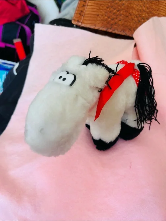 Plush White Horse with Red Ribbon