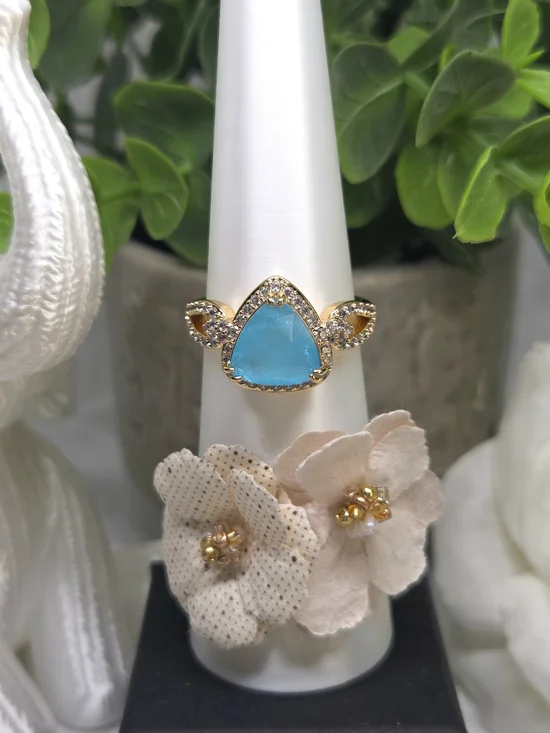 BP Gold Ring with Aqua-Marine Ice Crystal