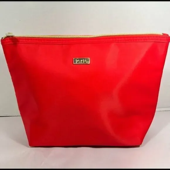 Tarte red cosmetic bag/ clutch, nice size with beautiful purple satin interior