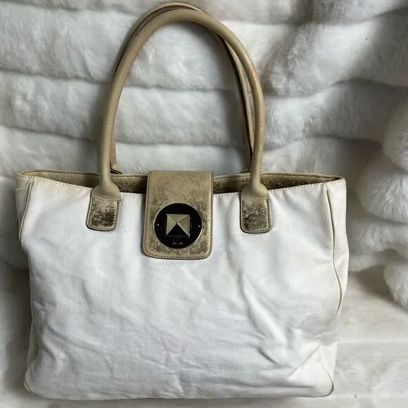 Vintage Kate spade beige canvas and faded gold trims shoulder bag.