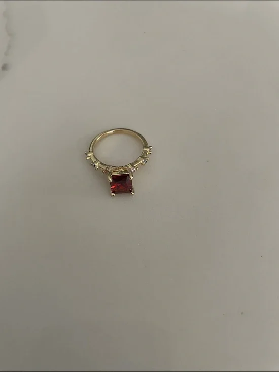 Gold tone Ring with Square red / orange colored center  and Accent Stones
