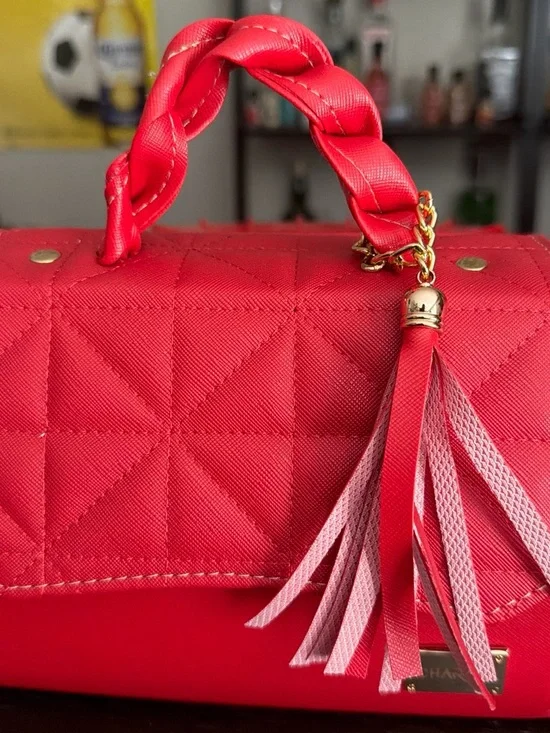 Quilted Red Crossbody Bag with Braided Handle and Tassel