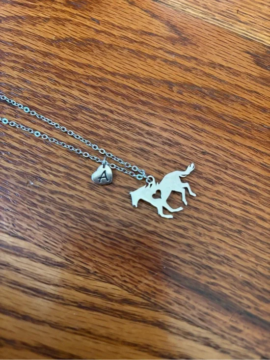 Silver necklace with horse pendant