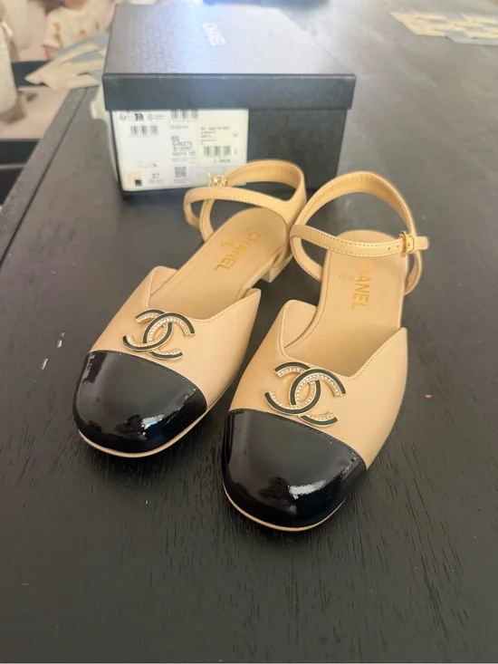 CHANEL Beige and Black Cap-Toe Logo Slingback Flats