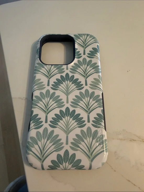 Casely Iphone 16 pro Phone Case with Teal Botanical Pattern - White and Teal