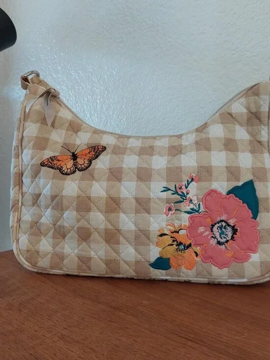 Vera Bradley Frannie Crescent Crossbody peach blossom picnic  is made from quilt