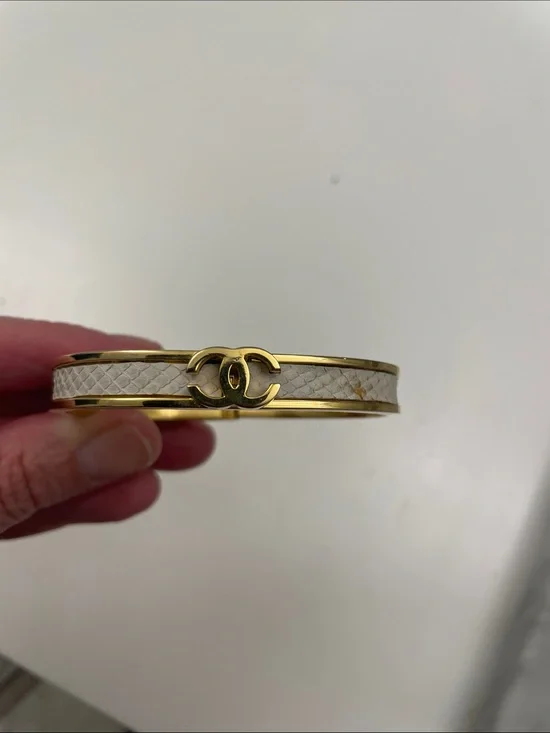 CHANEL vintage Gold and White CC Logo Leather-Trim Bangle Bracelet