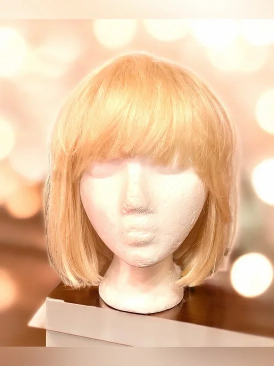Platinum Blonde Bob Wig with a Straight Cut and Classic Fringe Bangs