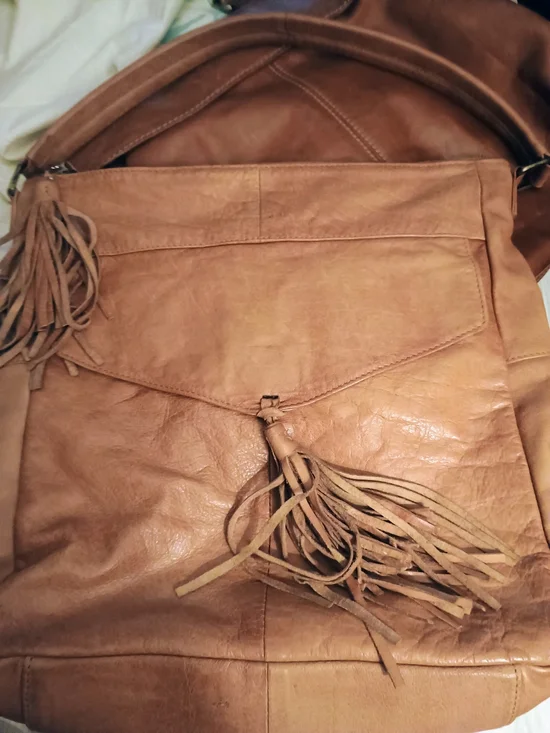 ANTHROPOLOGIE!! LEATHER TAN W/TASSELS!! 14 IN X 14 IN