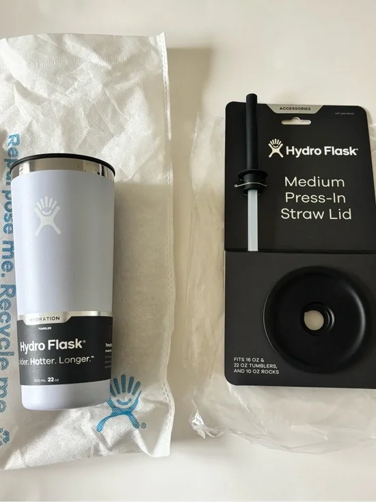 Hydro Flask 22 oz tumbler in light blue with silver lid & medium press in lid