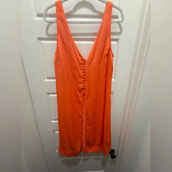 Free People. Orange Long Sleeveless Vneck Front & Back Blouse. Size 12.