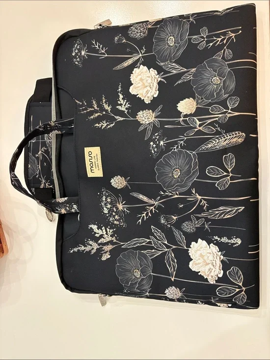 Mosiso brand Black Floral Laptop Bag with Cream Accents