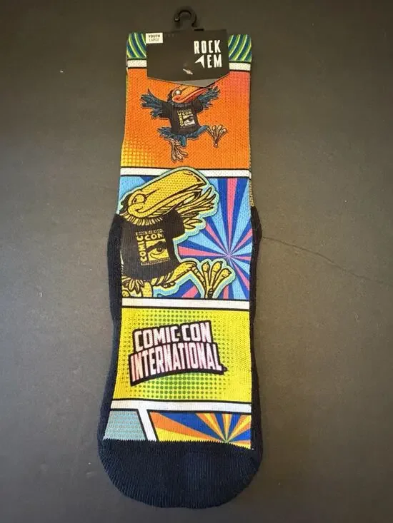 NWT San Diego Comic Con SDCC Official Rock ‘EM Socks~Comic Strip Yth L 2-5.5