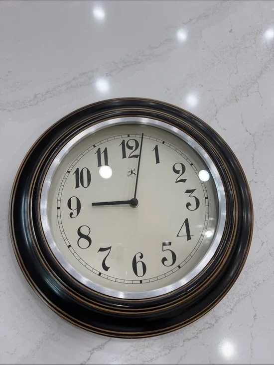 Classic Black Wall Clock with Antique Bronze Accents