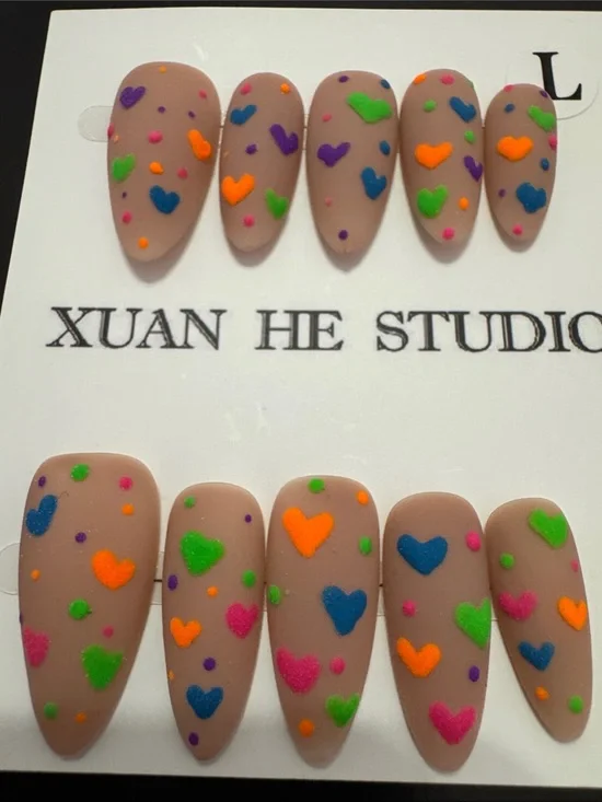 Nude Matte Press-On Nails with Neon Heart Accents