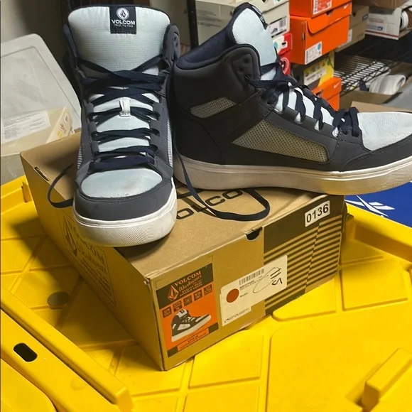 Volcom Black and Grey High-Top Design.  Reduced cost slight defect.  See picture