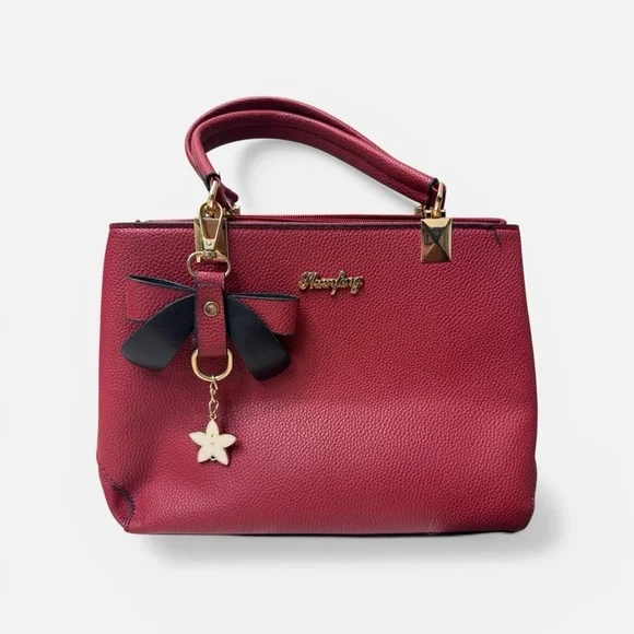 Charming Red Satchel with Bow by [Brand]