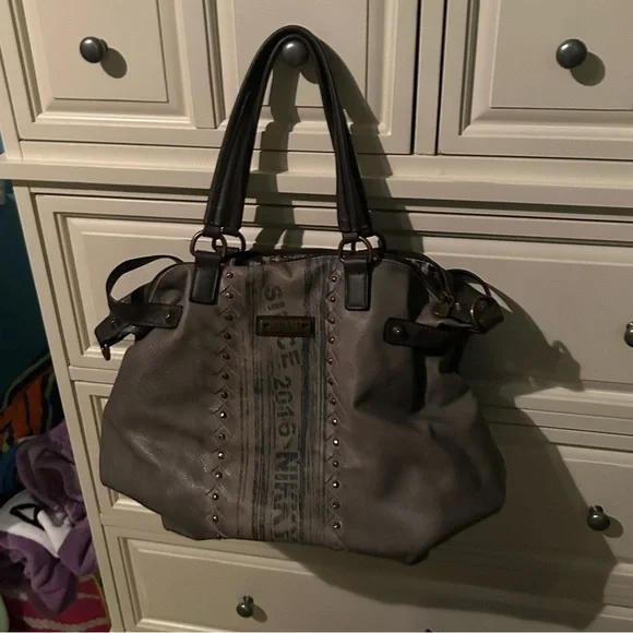 Nikki black leather handbag with blue detailing