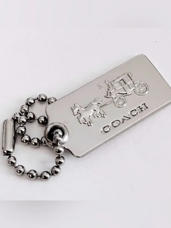 Coach Silver Tone Embossed Horse & Carriage Dog Tag Keychain