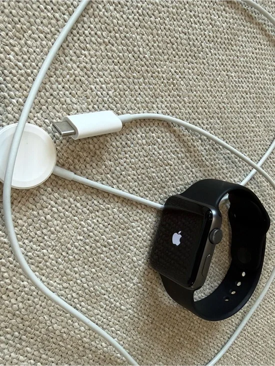Apple Watch in Black with White Magnetic Charger