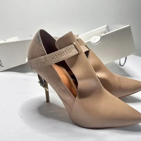 Aldo pointed toe stiletto heel and ankle strap. A pump with a flap in the front