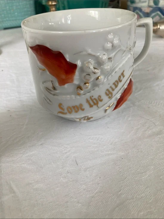Vintage White Porcelain Cup with Gold Script and Orange Accents