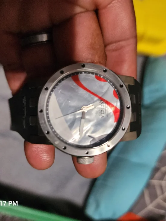 Invicta Black Stainless Steel Watch with Red Dial Accent