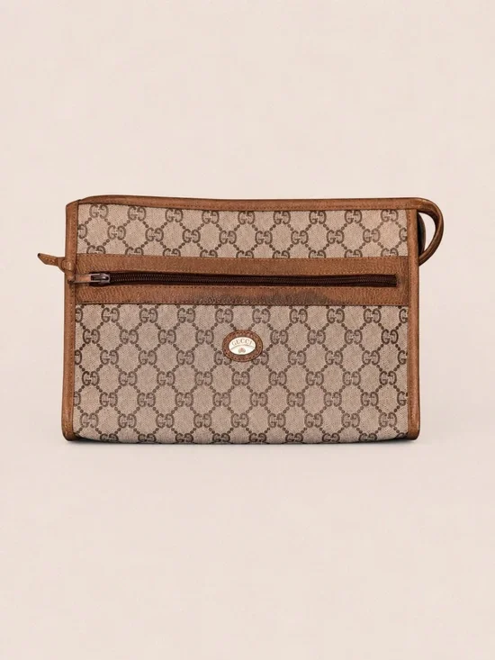Gucci GG Plus Supreme Clutch