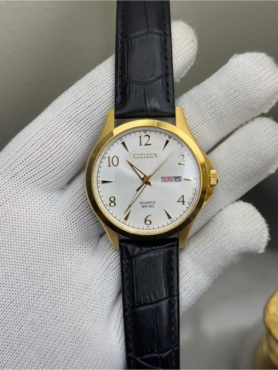 Citizen Classic Gold Case White Dial Watch with Black Leather Strap daydate mens