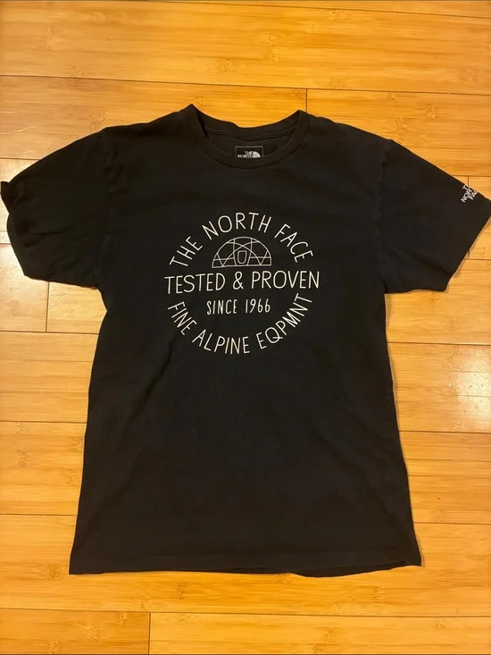 The North Face Black Tee with White Circular Logo