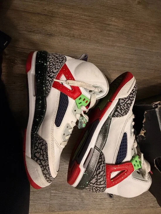 Air Jordan Spizike sneakers in white, red, and green.