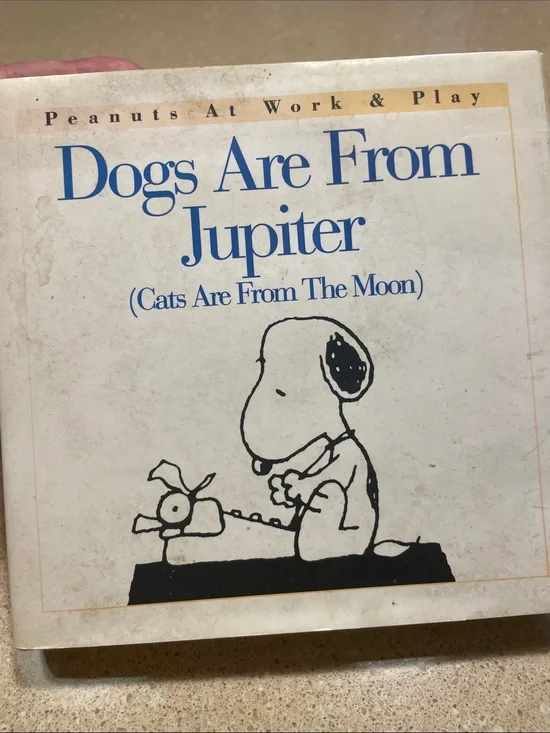 Peanuts Dogs Are From Jupiter Hardcover — White, Black, Blue