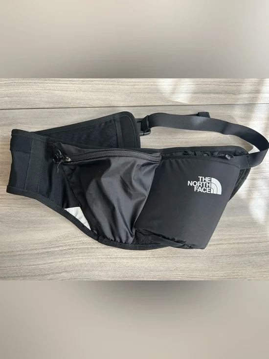 The North Face Black Sling Belt Bag with White Logo