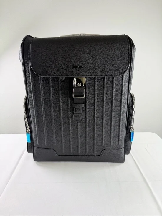 RIMOWA Black Textured Leather Backpack with Blue Zip Accents
