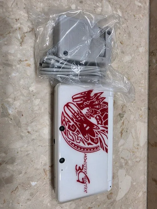 Nintendo 3ds Monster 3G White with 64gb memory card and charger