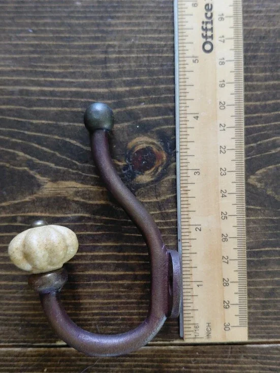 Rustic Brown Wall Hook Rack with Cream Ceramic Accents