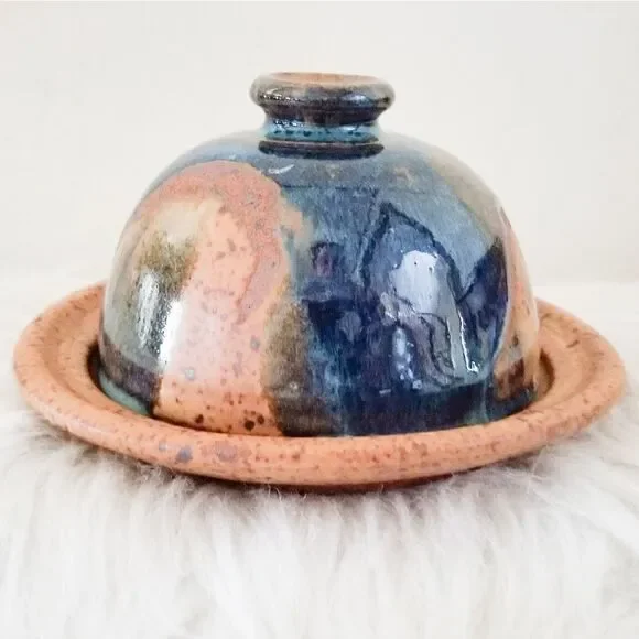 Pottery covered plate earth tones with blue
