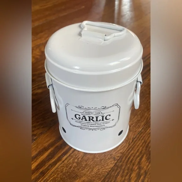 Metal garlic container