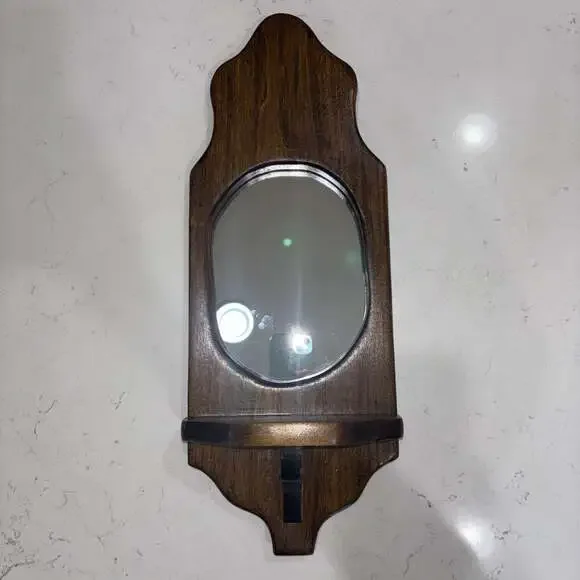 Vintage Wall-Mounted Dark Wood Sconce with Oval Mirror and Shelf