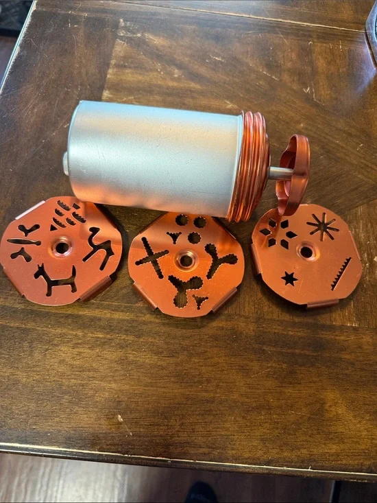 Cookie Press with Decorative Discs in good used condition