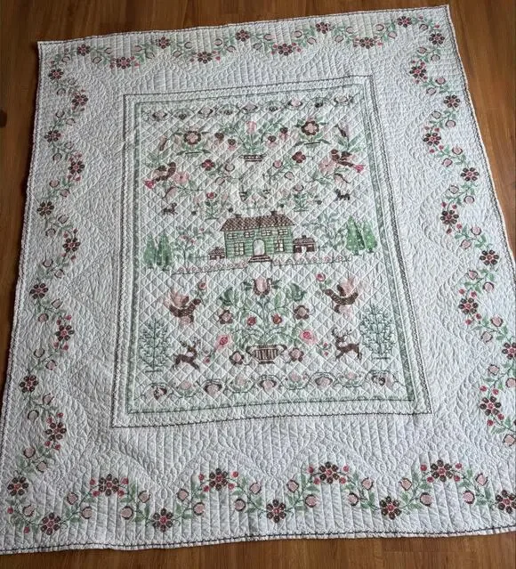 76 W x 96 L hand stitched quilt