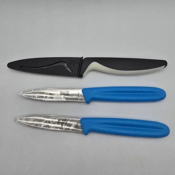 Kuhn Rikon Switzerland Steak Knife And Smaller Blue Knives‎