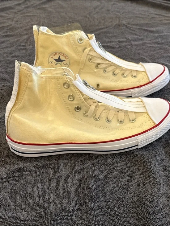 Converse white High Top Sneakers with vinyl zip cover.